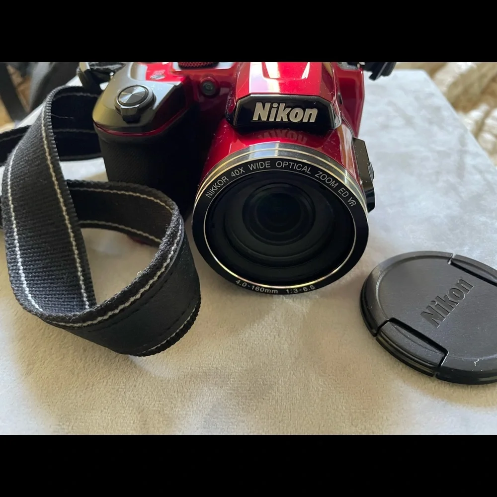COPY - New Red Nikon camera with the bag.